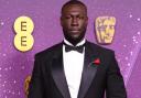 Stormzy has been fined after using his phone at the wheel in Kingston.