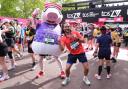 Joe Wicks and Daddy Pig after finishing the 2026 TCS London Marathon
