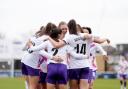 London City Lionesses' Jana Fernandez celebrates with her teammates after scoring the team's first goal during the Barclays Women's Super League match at the Chigwell Construction Stadium, Dagenham