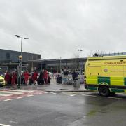 Emergency vehicles outside Heathrow Terminal 3 after the incident in December 2025
