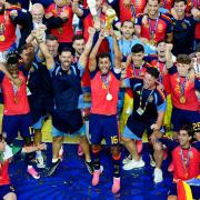 Spain’s Rodri lifts the FIFA World Cup Trophy