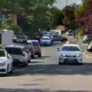 A boy has been stabbed and robbed in Mitcham