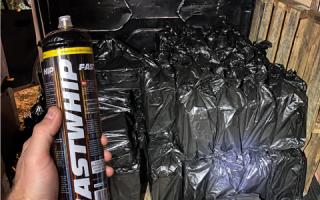 Police seized hundreds of nitrous oxide bottles and a quantity of cash during the operation